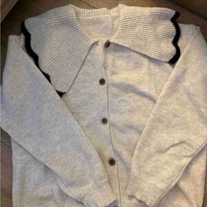 Cream Cardigan with Black Trimmed Collar